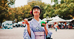 Slushie, vacation and Japanese woman in city with traditional kimono for dessert or sweet treat. Journey, happy and person with shaved ice snack with cultural dress for fashion in town on holiday.