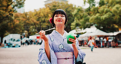 Buy stock photo Slushie, vacation and Japanese woman in city with traditional kimono for dessert or sweet treat. Travel, happy and person with shaved ice snack with cultural dress for fashion in town on holiday.