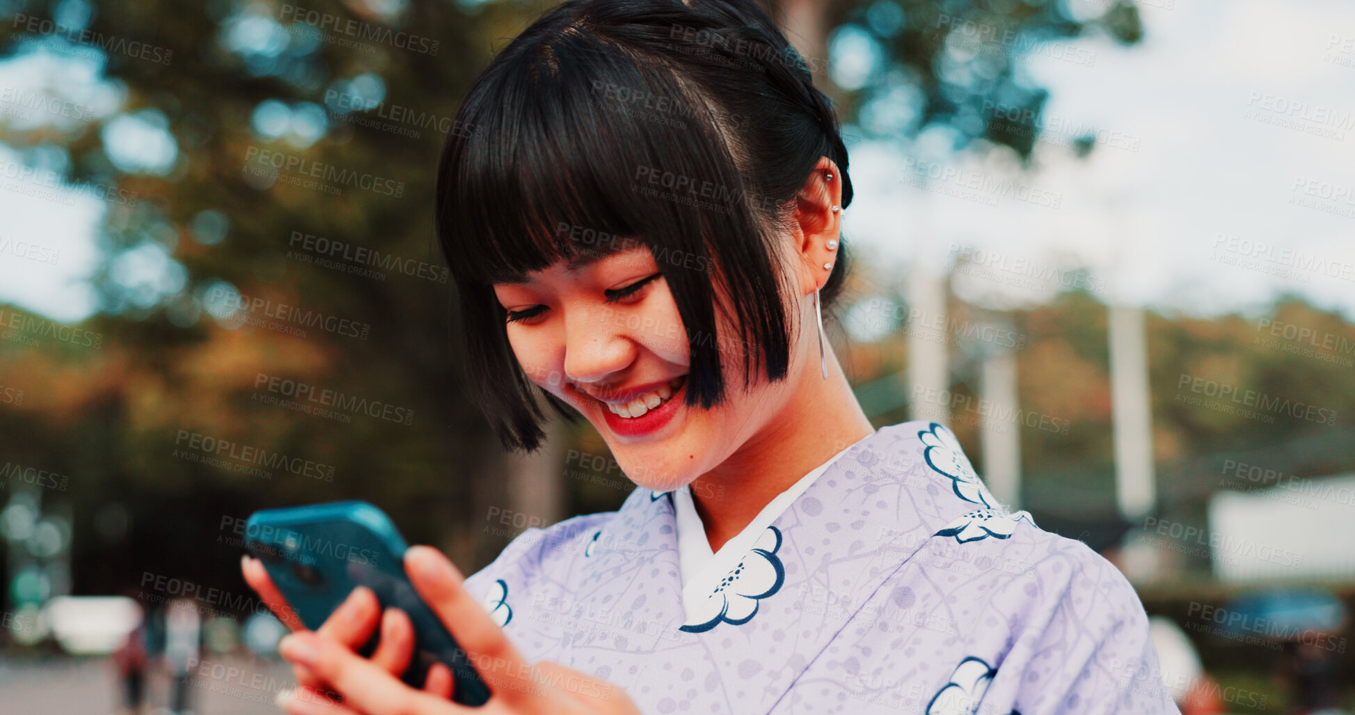 Buy stock photo Phone, travel and Japanese woman in city with traditional kimono networking on social media. Happy, cellphone and female person with cultural dress for stylish outfit in town for holiday with contact