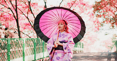 Buy stock photo Sakura, park and woman with kimono, umbrella or sightseeing on outdoor adventure. Fashion, spring and happy Japanese girl walking with traditional clothes, parasol or culture in cherry blossom garden