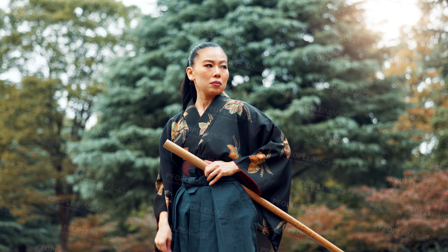 Buy stock photo Park, martial arts and Asian woman with bamboo sword in nature for training, Kendo practice and exercise. Culture, bokuto and person with shinai for skills, fitness and traditional technique in Japan