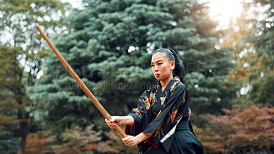 Buy stock photo Park, training and Asian woman with bamboo sword in nature for martial arts, Kendo practice and exercise. Culture, bokuto and person with shinai for skills, fitness and traditional sports in Japan