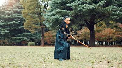 Buy stock photo Nature, fight and Asian woman with bamboo sword in park for martial arts, Kendo practice and exercise. Culture, bokuto and person with shinai for skills, fitness and traditional training in Japan