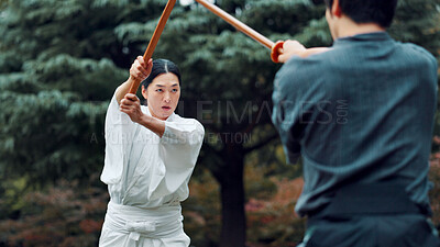 Buy stock photo People, fight and sword in park for kendo, demonstration and fitness challenge in Tokyo. Japanese martial arts, teacher and outdoor with bamboo shinai for class, culture heritage or traditional sport
