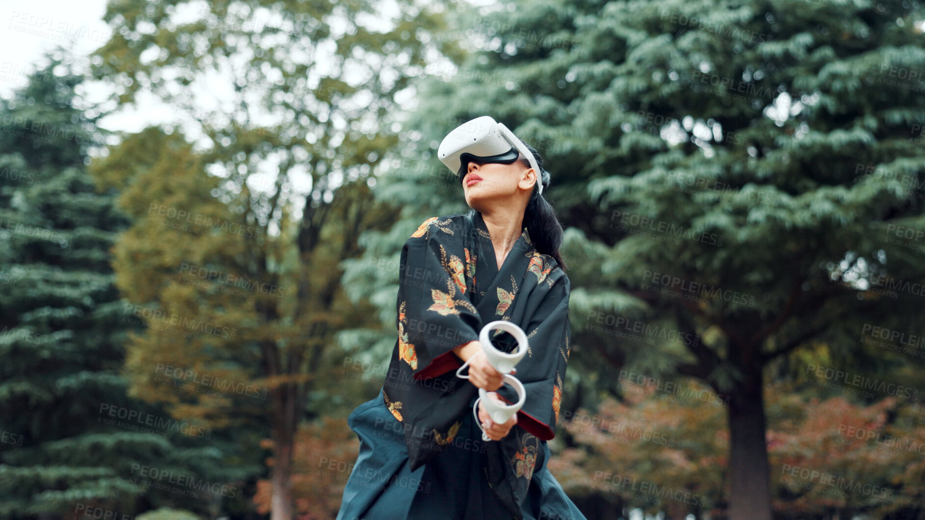 Buy stock photo Virtual reality, park and Asian woman with controller for martial arts, sword practice and exercise. Culture, Japan heritage and person with shinai, VR tech and goggles for Kendo, fight and training