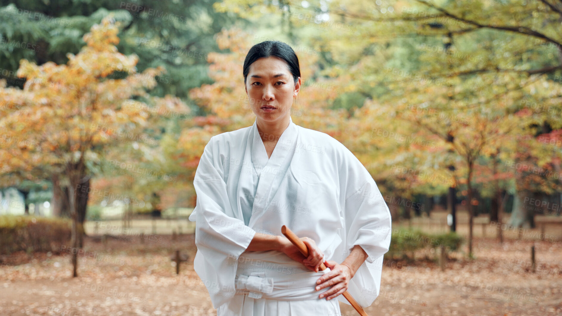 Buy stock photo Training, serious and woman with skills martial arts and weapon for practice, fighter and aikido. Outdoor, fitness and Asian person with bamboo sword for technique, discipline and kendo in Japan