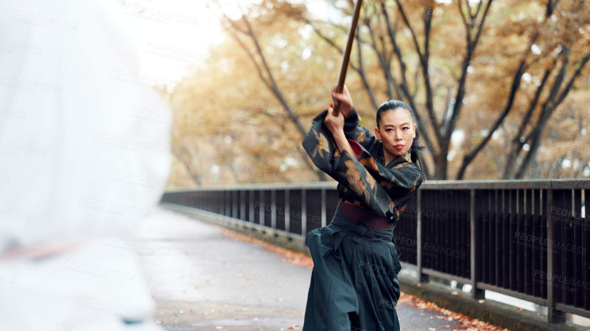 Buy stock photo City, bamboo sword and Asian people on bridge for martial arts, Kendo practice and exercise. Culture, heritage and person with shinai for skill challenge, fight and training with sensei in Japan