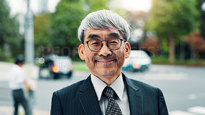 Buy stock photo Happy, glasses and portrait of businessman in city with positive attitude for finance career. Smile, confident and Japanese mature male financial executive with pride for company revenue in town.