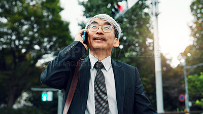 Buy stock photo Phone call, business and man in city, travel and conversation with digital app, chatting or talking. Mature person, employee or accountant in street, smartphone or communication with contact or Japan