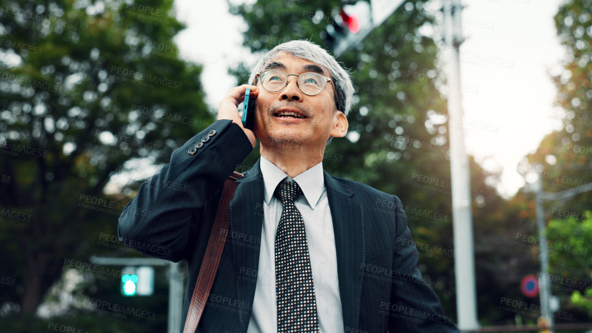 Buy stock photo Phone call, business and man in city, travel and conversation with digital app, chatting or talking. Mature person, employee or accountant in street, smartphone or communication with contact or Japan