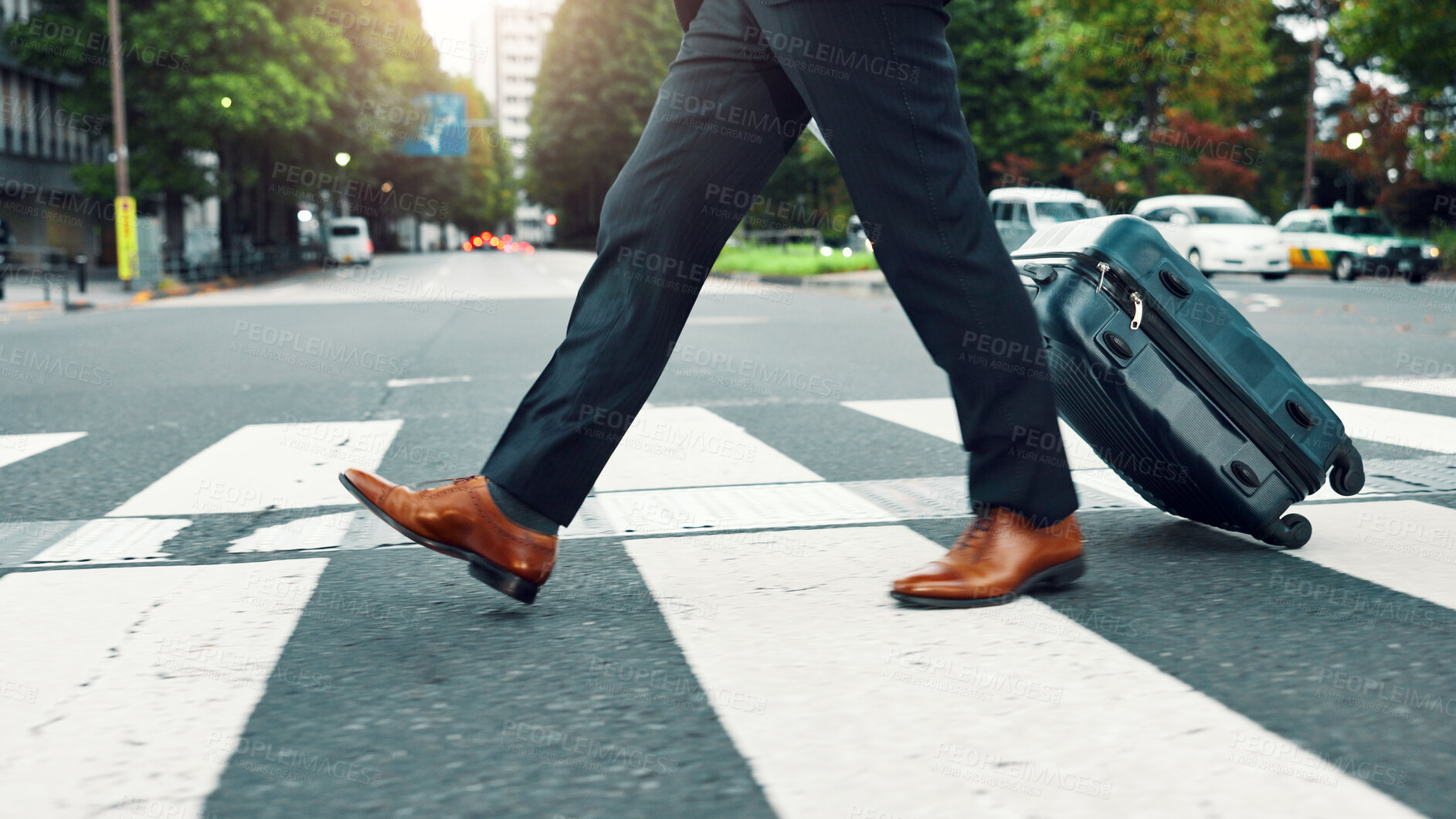 Buy stock photo Feet, suitcase and businessman in street for travel with corporate trip or commuting pedestrian in city. Shoes, luggage and closeup of male lawyer legs walking in road in urban town in Japan.