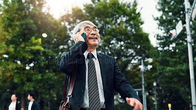 Buy stock photo Phone call, smile and mature man with smartphone, travel and commuting to work, talking and business. Conversation, outdoor and Asian person with mobile, networking and discussion for sales in Japan