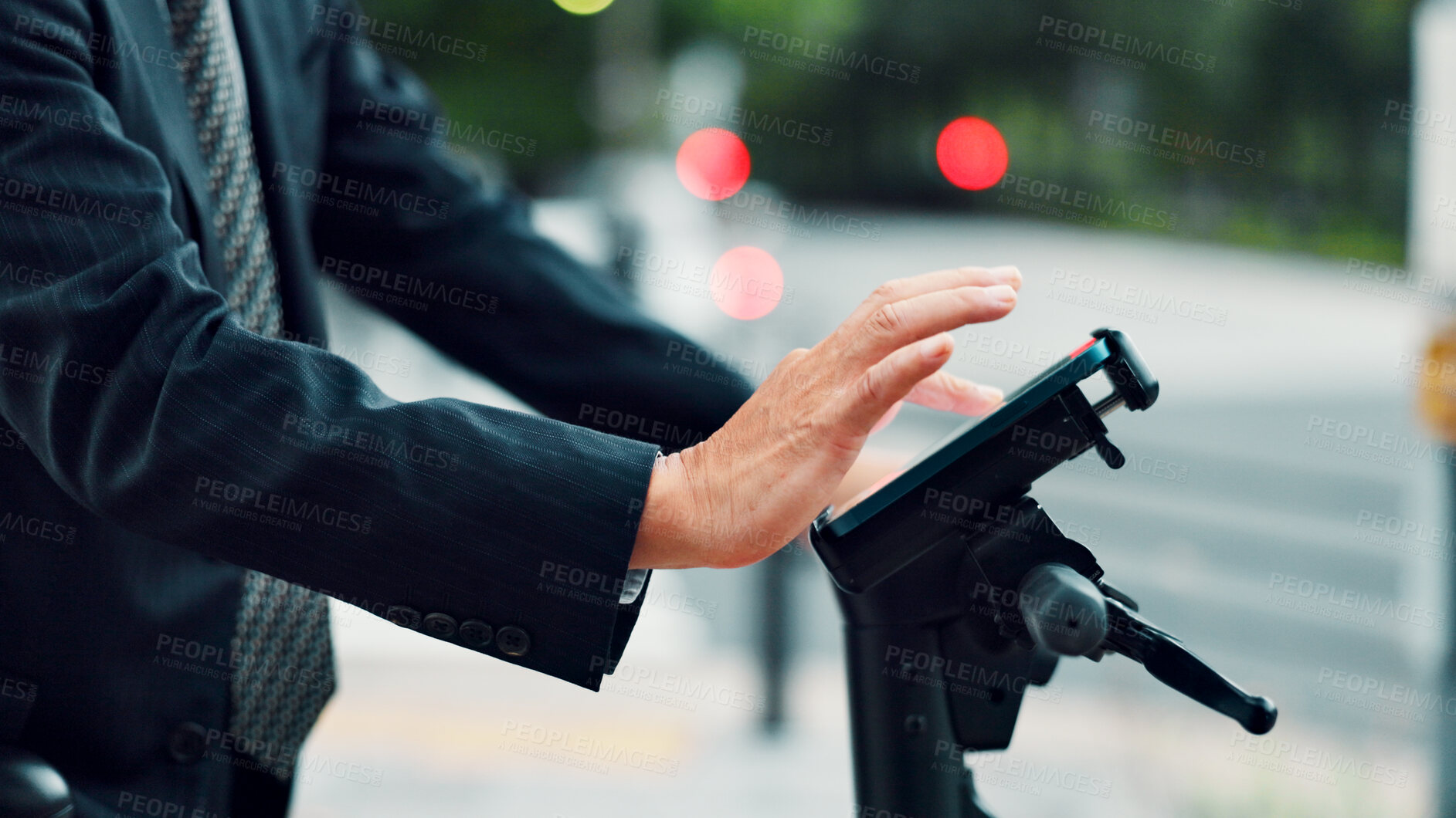 Buy stock photo Hands, person and phone on ebike in city for travel directions, sustainable transport and networking. Worker, typing and mobile on electric bicycle with communication, navigation and commute in Japan