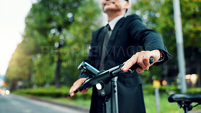 Buy stock photo Hands, man and walking with ebike in city for sustainable transport, eco friendly and carbon neutral travel. Mature person, electric bicycle and morning commute, urban journey and adventure in Japan