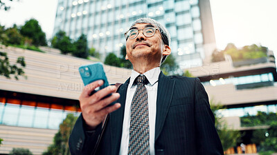 Buy stock photo Thinking, business and man with phone in city for communication, planning travel and schedule update. Mature, person and mobile with negotiation feedback, location directions and information in Japan