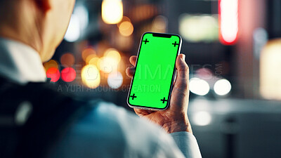 Buy stock photo Night, city and person with phone, green screen and tracking marker for travel website in Japan. Smartphone, chromakey and man on mobile app for online map, location search or urban commute from back