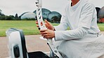 Hands, archer and bow for training, equipment and preparing for competition, sports and outdoor for game. Contest, athlete and practice from tournament, skills and challenge for person in Japan