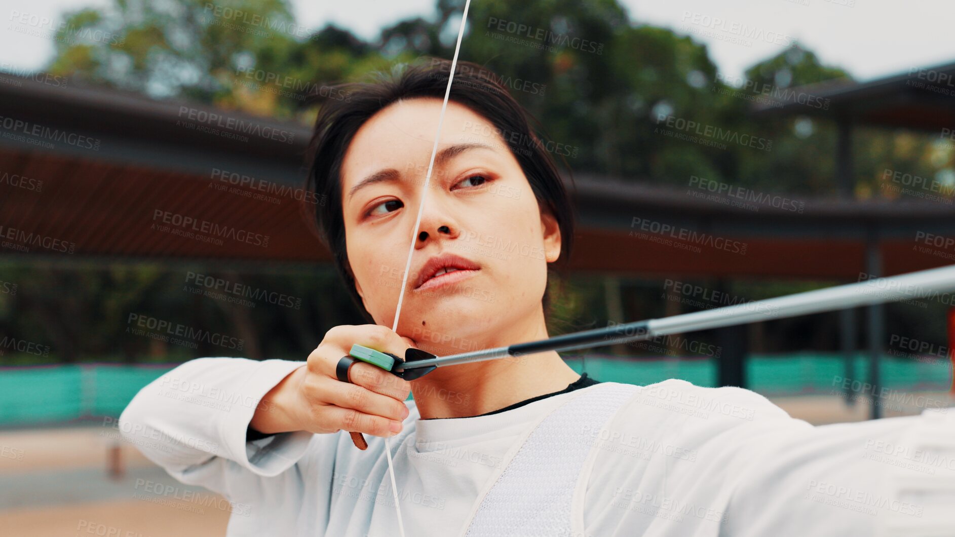 Buy stock photo Woman, archery and aim at field with sport for shooting practice and training as athlete in Japan. Tournament, female person and setup recurve bow or equipment for challenge, game  and competition 