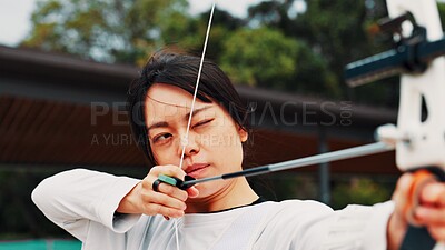 Buy stock photo Woman, archer and bow for training, aim and preparing for competition, equipment and outdoor for game. Contest, archery and practice from tournament, skills and challenge for person, sports and Japan