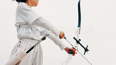 Buy stock photo Hands, athletic and bow for practice, game and preparing for competition, equipment and outdoor for contest. Sports, athlete and training for tournament, skills and challenge for person in Japan