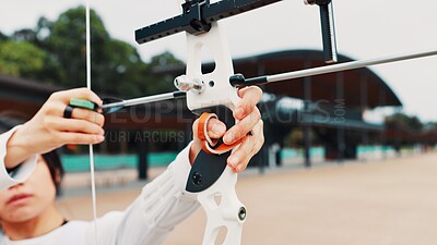 Buy stock photo Hands, archer and bow for training, aim and preparing for competition, equipment and outdoor for games. Contest, athlete and practice for tournament, skills and challenge for person, sport and Japan