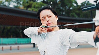 Buy stock photo Woman, aim and arrow for archery practice at academy, outdoor exercise and bow precision. Female person, shooting challenge and park for competition games, learning and sports with tool in japan