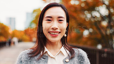 Buy stock photo Portrait, Japanese woman and smile in city with vacation travel, sightseeing and journey of destination. Happy, female person and pride for morning commute, urban location and holiday abroad in Japan