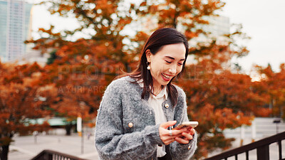 Buy stock photo Travel, laughing and woman with phone at park with meme, gif and comedy blog on notification app in Japan. Funny, mobile and Asian person outdoor for chat, reading post and social media on vacation