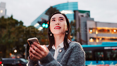 Buy stock photo Thinking, mobile and woman in city for travel, text or message on app in Japan. Planning, phone and Asian person outdoor for dream vacation, future vision and ideas for blog on internet at night