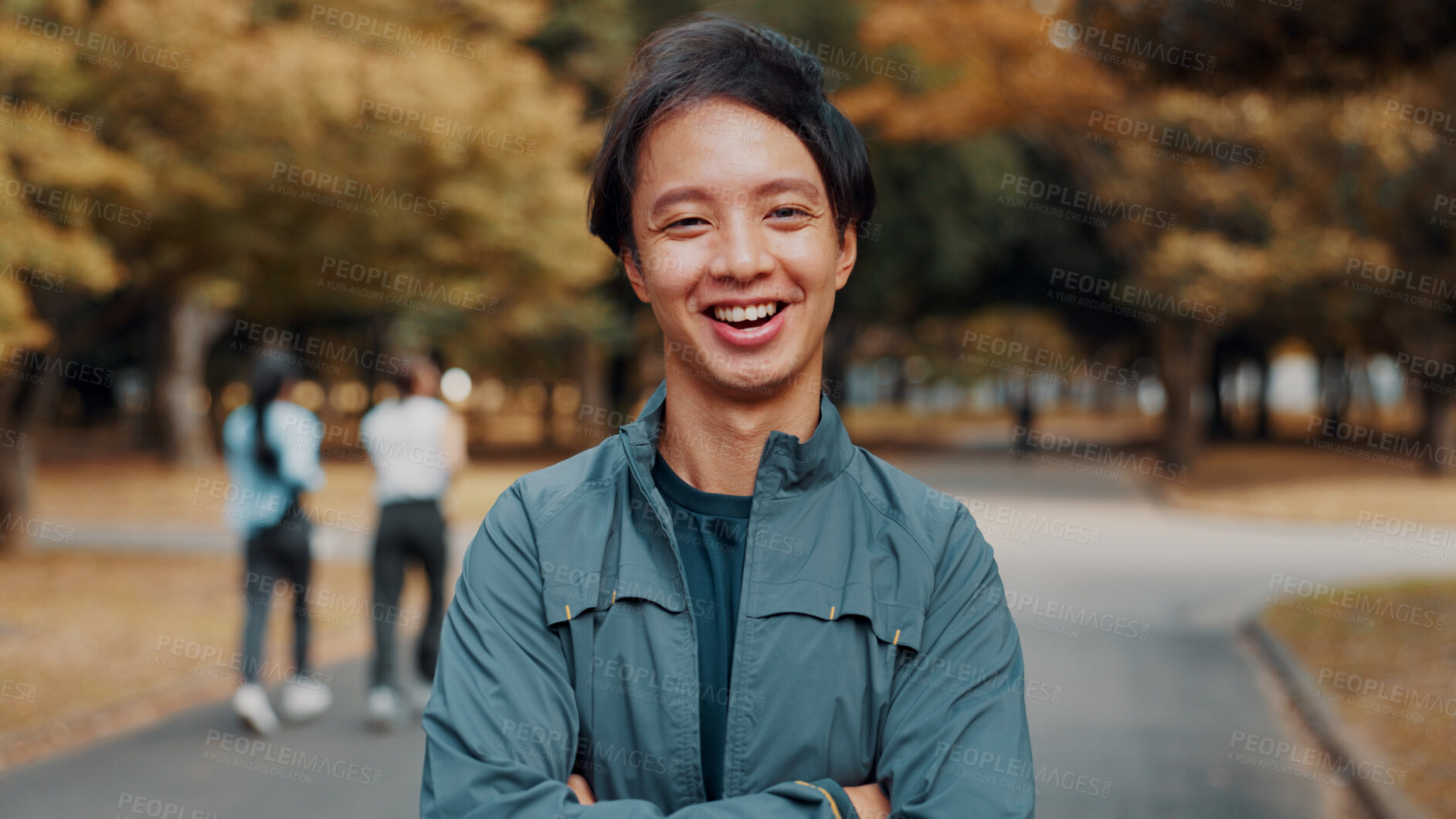 Buy stock photo Happy, crossed arms and portrait of man in nature for fitness, health and wellness exercise. Outdoor, smile and male athlete with confidence for cardio workout with marathon training in park in japan
