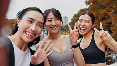 Buy stock photo Fitness, friends and selfie of women in portrait outdoor together for workout break, laugh and face. Happy group, sport and girls take picture at park for social media, wave and peace sign in Japan