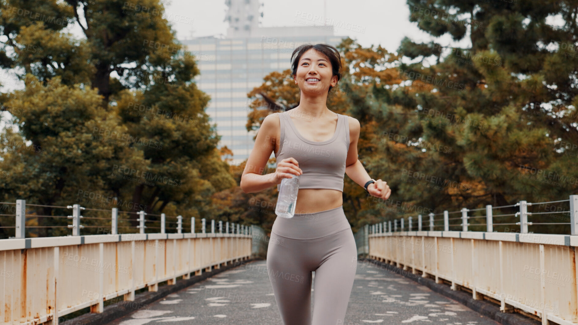 Buy stock photo Woman, running and thinking on health in city, fitness and outdoor nature for dream of weight goals. Female person, urban park and reflection on exercise results, bottle and cardio workout in Japan