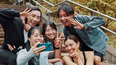 Buy stock photo Fitness, friends and selfie of people outdoor together on steps for workout break, body health or wellness. Happy group, sport and picture at park for social media post, wave or peace sign in Japan