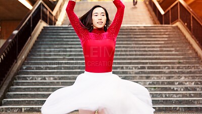 Buy stock photo Woman, ballet and dancing in city, stairs and creative at park, tutu and outdoor for performance. Person, ballerina and balance with moving, rhythm and concert with talent for street art in Japan