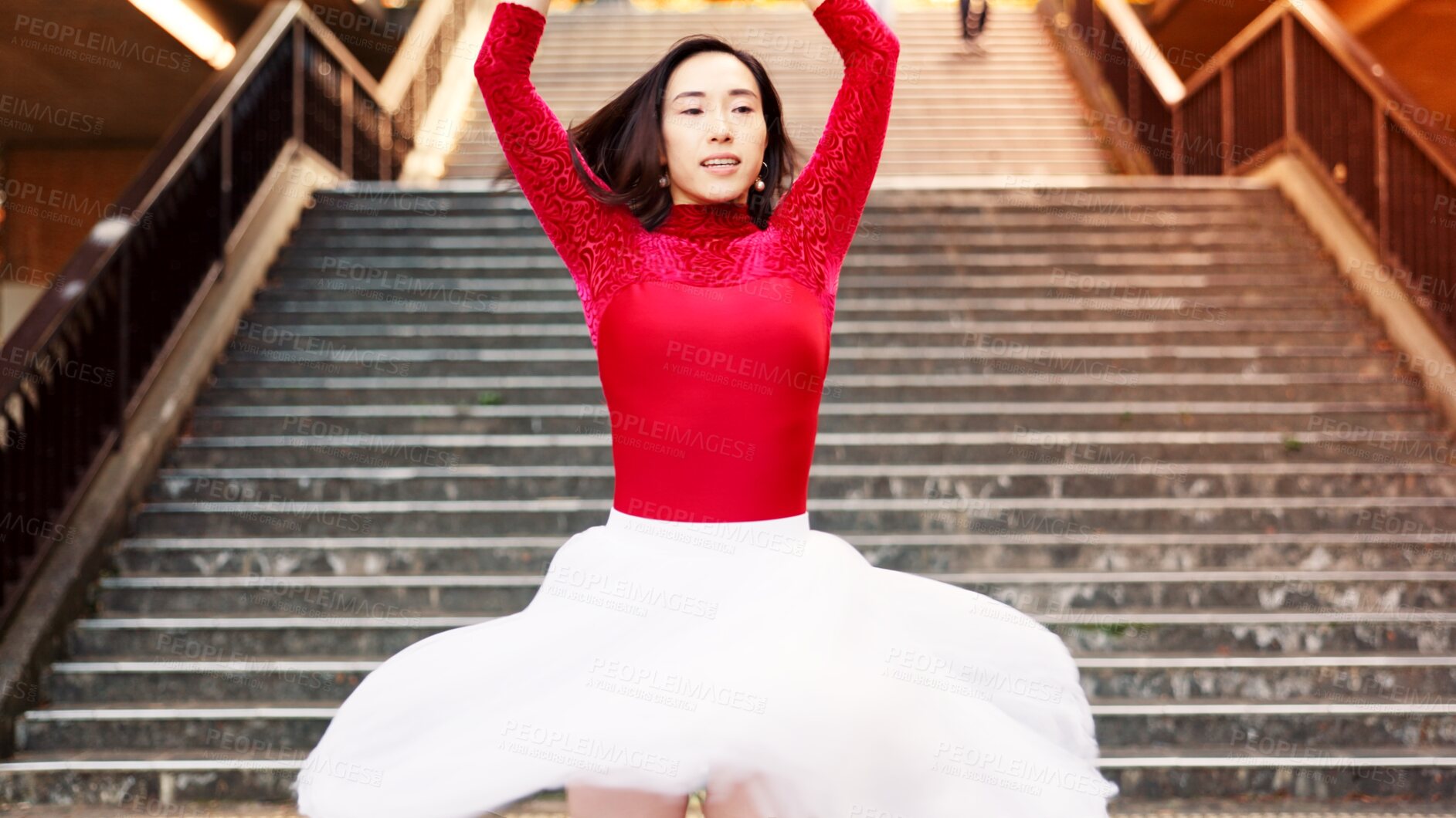 Buy stock photo Woman, ballet and dancing in city, stairs and creative at park, tutu and outdoor for performance. Person, ballerina and balance with moving, rhythm and concert with talent for street art in Japan