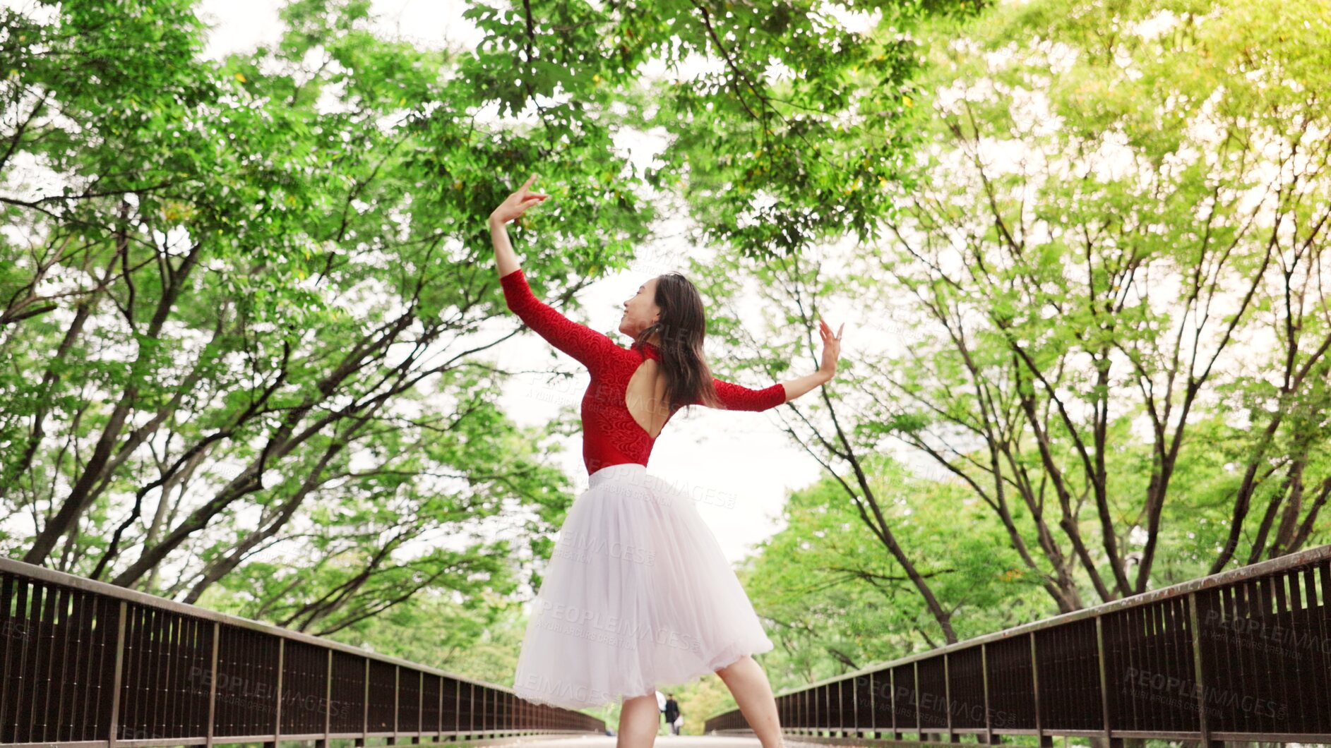 Buy stock photo Woman, training and ballet dancing in nature, outdoor and practice performance in park. Female person, professional dancer and creative talent in Japan, rehearsal and urban garden for elegant art