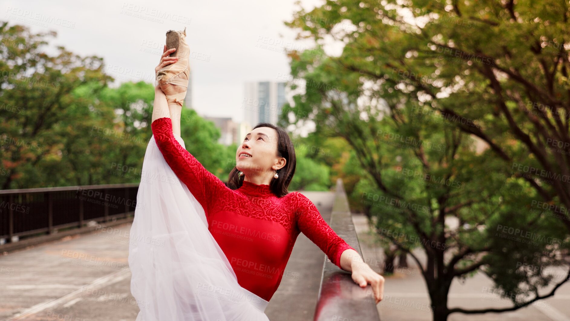 Buy stock photo Woman, exercise and ballet stretching in nature, outdoor and practice performance in park. Female person, professional dancer and creative talent in Japan, rehearsal and urban garden for elegant art