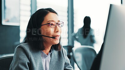 Buy stock photo Woman, telemarketing operator and customer support computer in office, talk and advisor to client. Female person, call centre representative and helping consumer with loan in Japan insurance agency