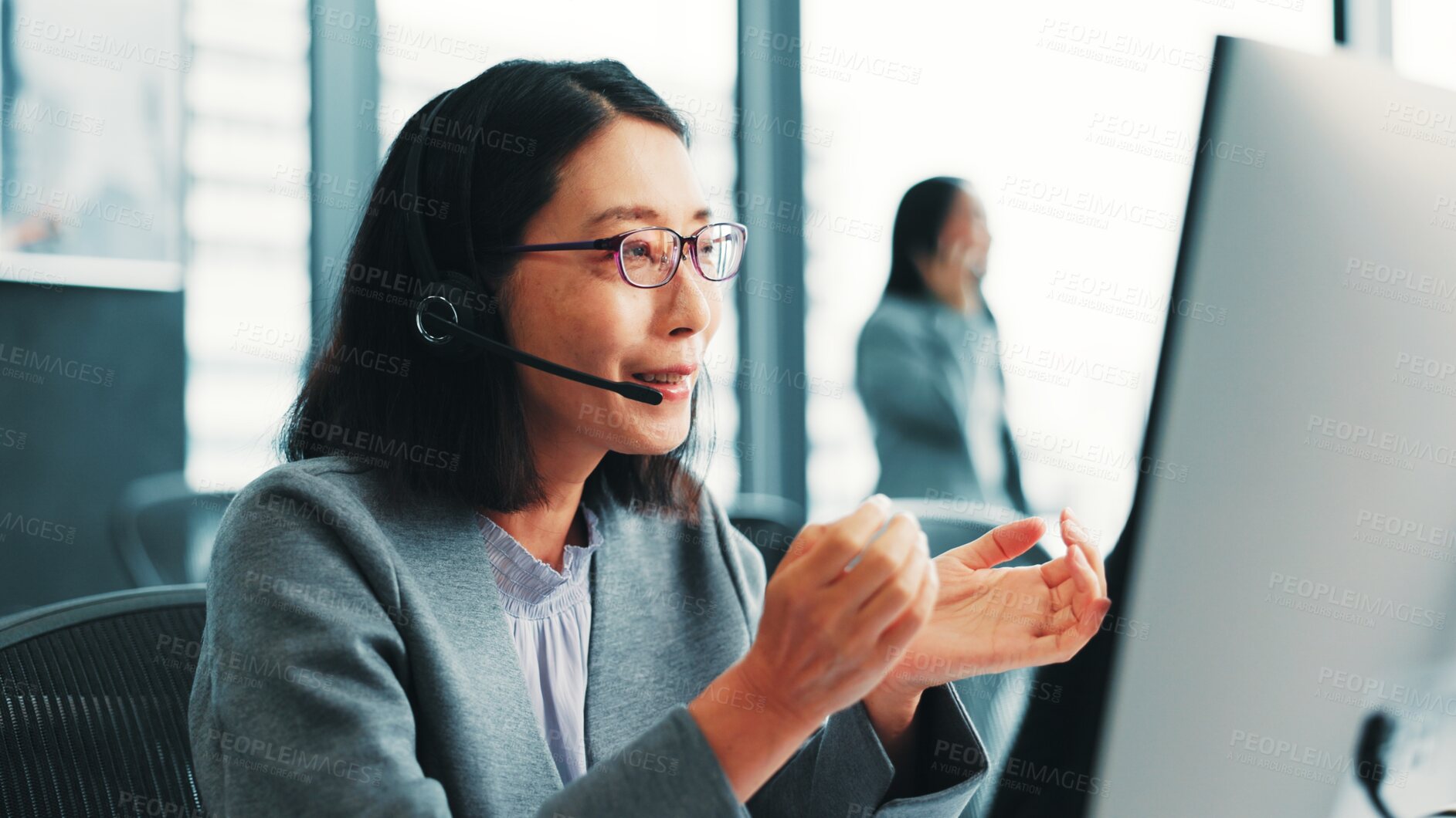 Buy stock photo Woman, telemarketing computer and customer support agent in office, talking and advisor to client. Female person, call centre representative and helping consumer with loan in Japan insurance agency