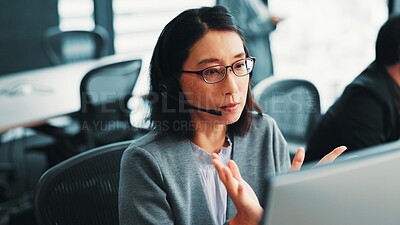 Buy stock photo Woman, computer and customer support agent in office, talking and advisor to client on website. Female person, call centre representative and helping consumer with loan in Japan insurance agency