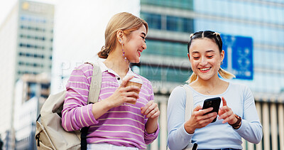 Buy stock photo Happy, students and phone in city for social media, gossip story and funny message in Osaka. Japanese women, mobile and friends in urban town for travel, commute and viral video for celebrity news