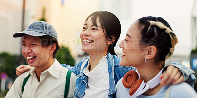 Buy stock photo Happy, asian students or hug with laugh in city for social, community or friendship together. Japan, group or friends walking with joy for bonding, fun moment or humor for funny joke in an urban town