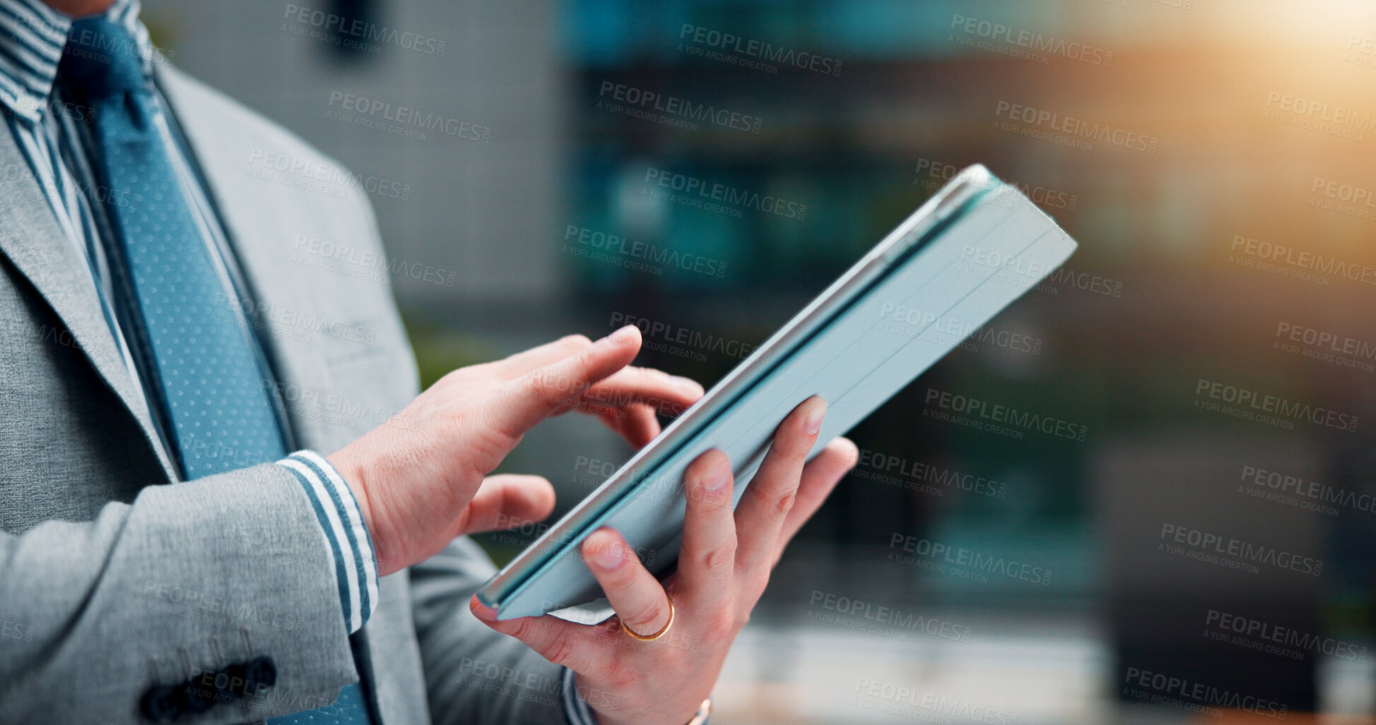 Buy stock photo Business person, hands and browsing with tablet in city for updates, network or news. Japan, employee or closeup with technology or app for communication, online search or connection in an urban town