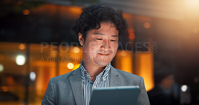 Buy stock photo Asian man, night or business with tablet in city for communication, online trading or stock market research. Japan, businessman or trader with smile or technology in late evening for foreign exchange