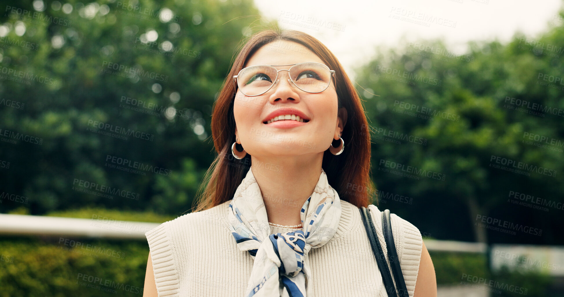 Buy stock photo Outdoor, travel and walking with woman, smile and thinking with journey, holiday and calm. Japanese person, tourist and girl with weekend break, commute and vacation with nature or contemplation