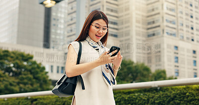 Buy stock photo Japan, surprise and woman in city, smartphone and smile with connection, travel and internet. Asian person, outdoor and girl in street, email or cellphone with social media, shocked and announcement