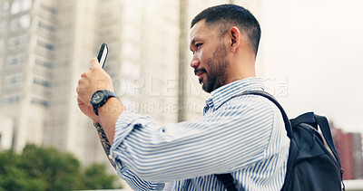 Buy stock photo Man, phone and travel in city with search for direction, location or hotel with mobile application in street. Person, smartphone and check route with map, web and commute on urban sidewalk in Japan