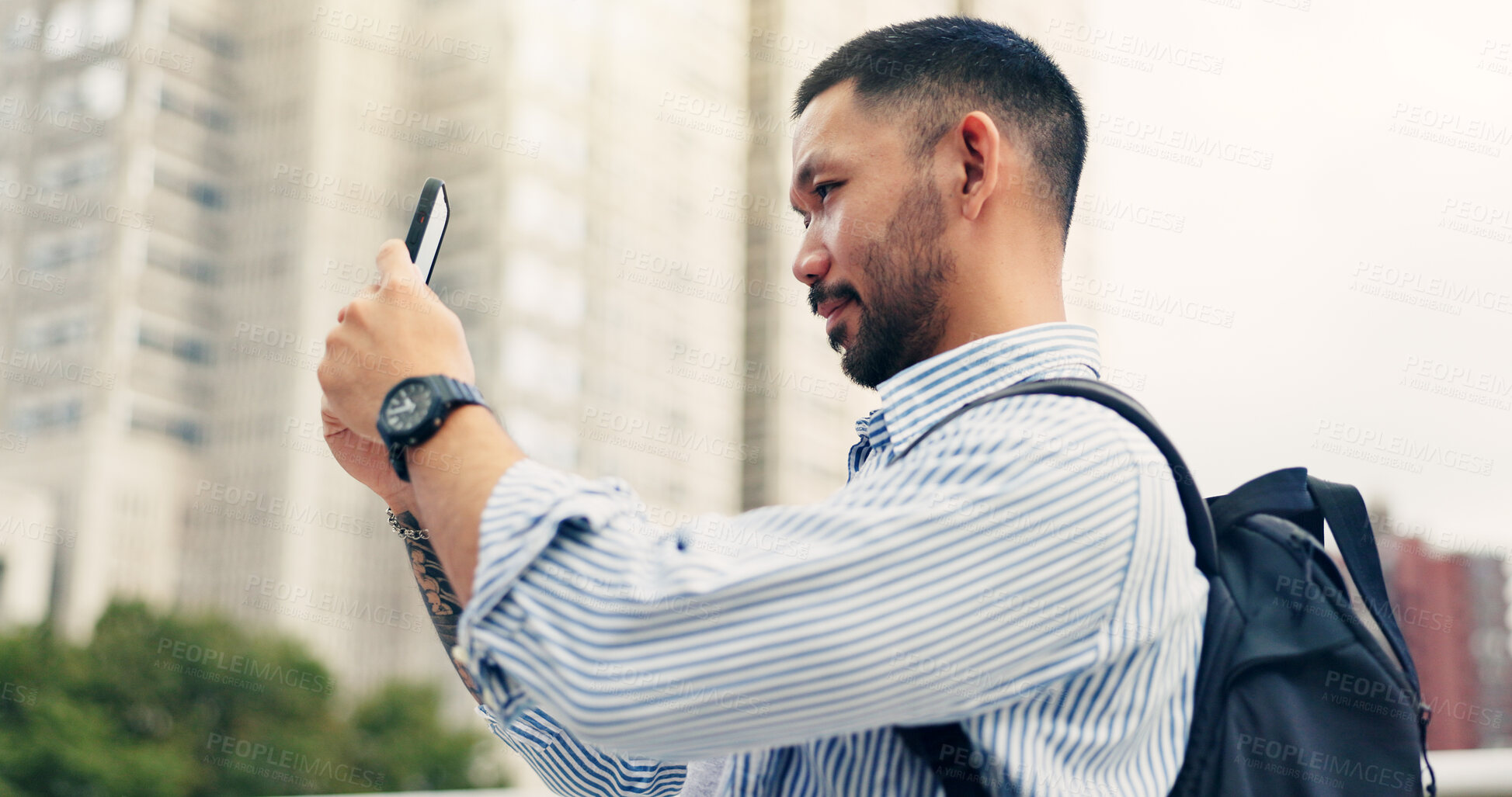 Buy stock photo Man, phone and travel in city with search for direction, location or hotel with mobile application in street. Person, smartphone and check route with map, web and commute on urban sidewalk in Japan