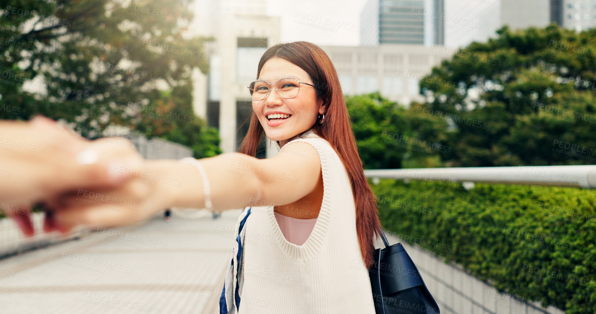 Buy stock photo Holding hands, couple and Asian woman in city for travel, commute and journey to explore town. Dating, love and happy people walking outdoors for adventure, trip and sightseeing together in Japan