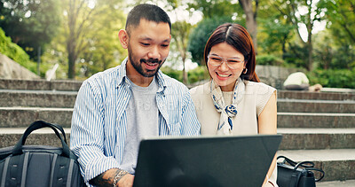 Buy stock photo Couple, laptop and happy at park, travel or stairs with search for direction, holiday and planning. Man, woman and reading with pc with bags, smile and check notification for hotel booking in Japan
